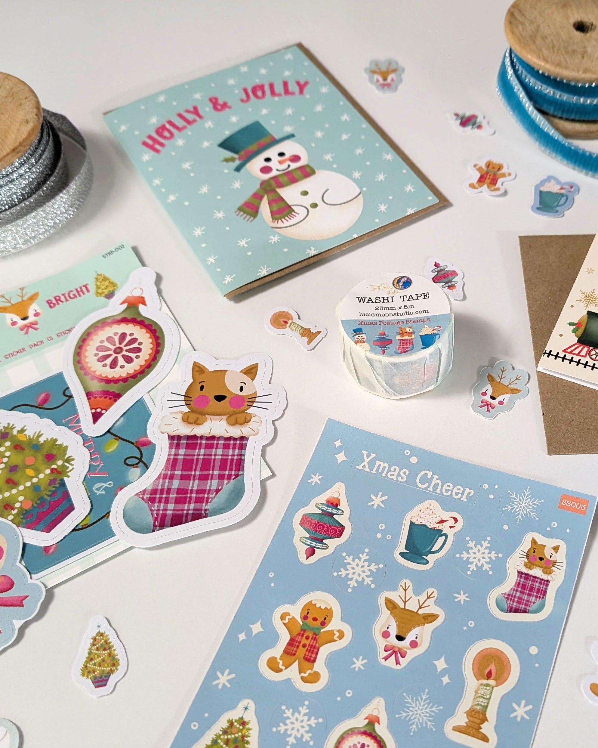 A large selection of holiday Christmas products including greeting cards, stickers, Xmas washi tape, and more!