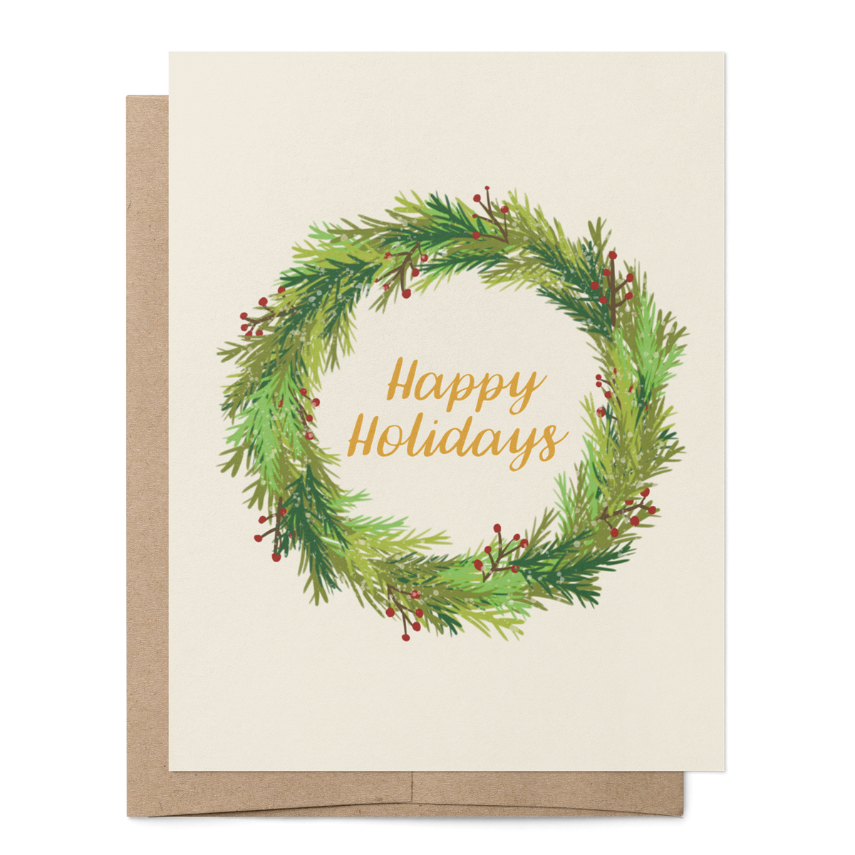 A holiday greeting card with a watercolor green wreath and gold 'Happy Holidays' text, shown with a brown kraft envelope on a white background.