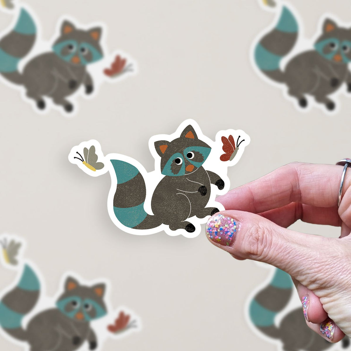 Raccoon with Butterflies Vinyl Sticker stickers Lucid Moon Studio