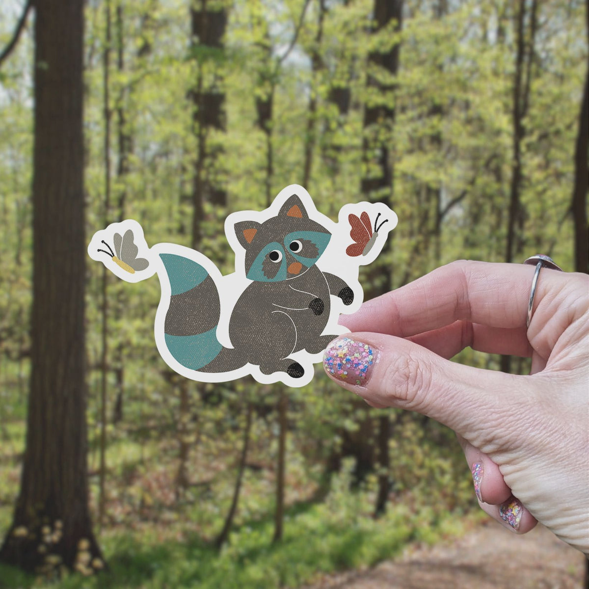 Raccoon with Butterflies Vinyl Sticker stickers Lucid Moon Studio