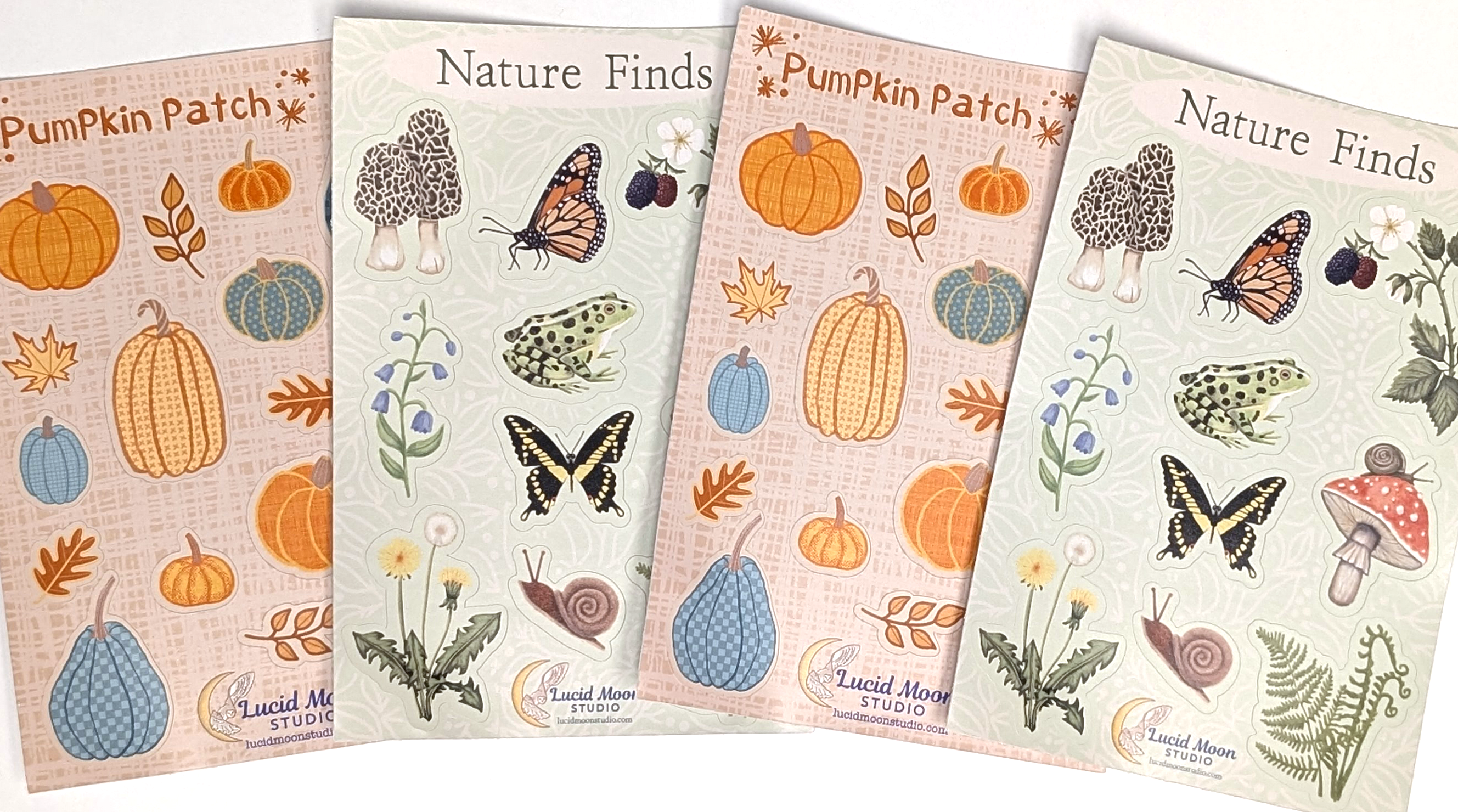 A photo of a selection of matte and glossy die-cut vinyl waterproof weatherproof sticker sheets featuring cute whimsical hand-drawn illustrations. 