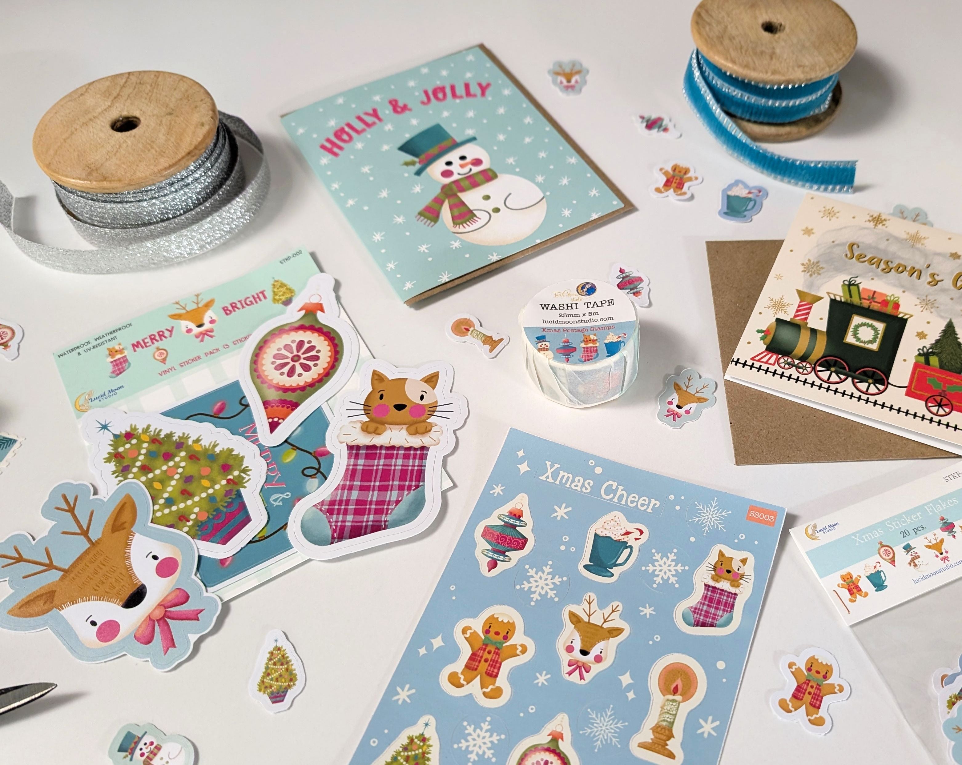 A large selection of holiday Christmas products including greeting cards, stickers, Xmas washi tape, and more!