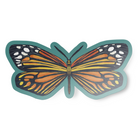 Vinyl sticker with a hand-drawn butterfly with orange, yellow, and black wings on a teal green background