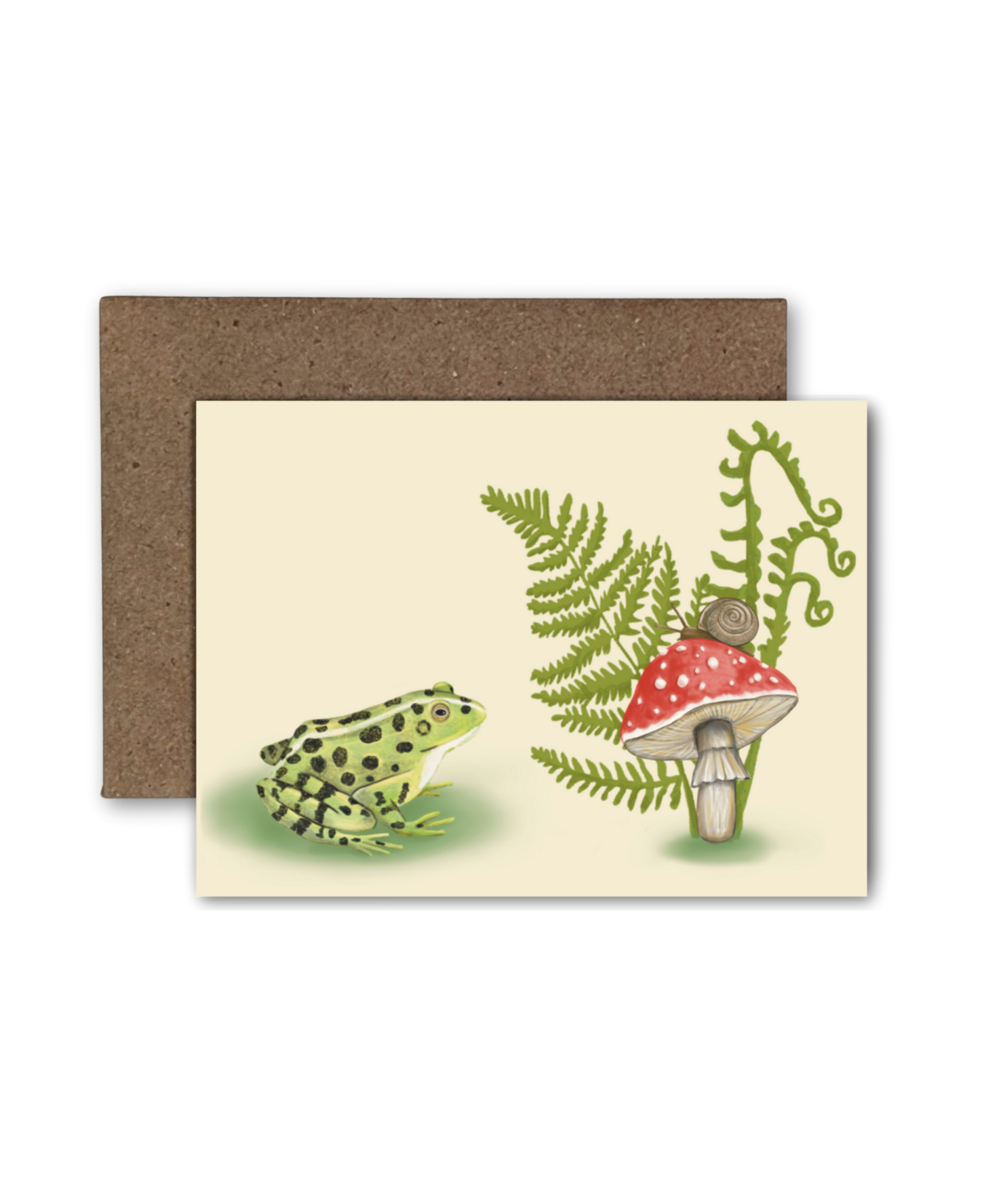 Blank mini card featuring a frog, fern, and mushroom on a tan background with a brown kraft envelope.