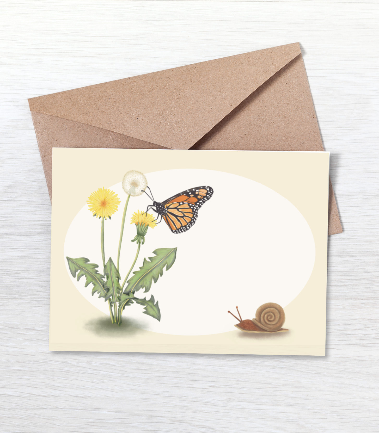 Blank mini card featuring a monarch butterfly and dandelions on a white and tan background with a brown kraft envelope.