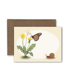 Blank mini card featuring a monarch butterfly and dandelions on a white and tan background with a brown kraft envelope.