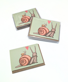 Boxed set of 8 snail-themed mini cards with kraft envelopes. Four different card designs.