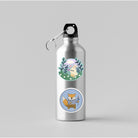 A silver water bottle with kawaii bunny in a meadow and raccoon holding flowers matte vinyl die cut stickers on it.