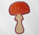 Linocut Mushroom Matte Vinyl Sticker stickers Lucid Moon Studio Red and tan mushroom burgundy background 