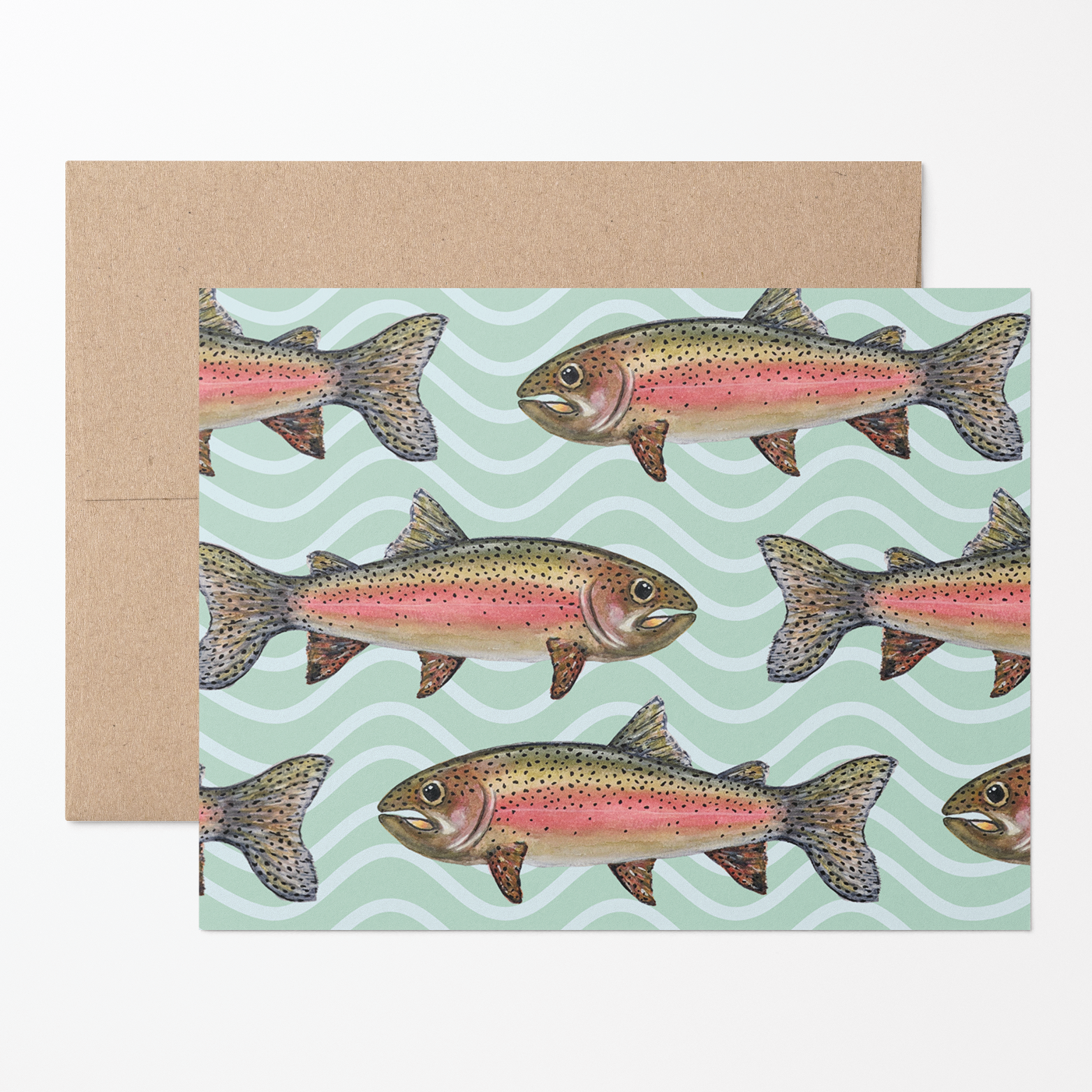 Greeting card with a school of watercolor rainbow trout illustrations on a mint green wavy pattern background with a brown kraft envelope.