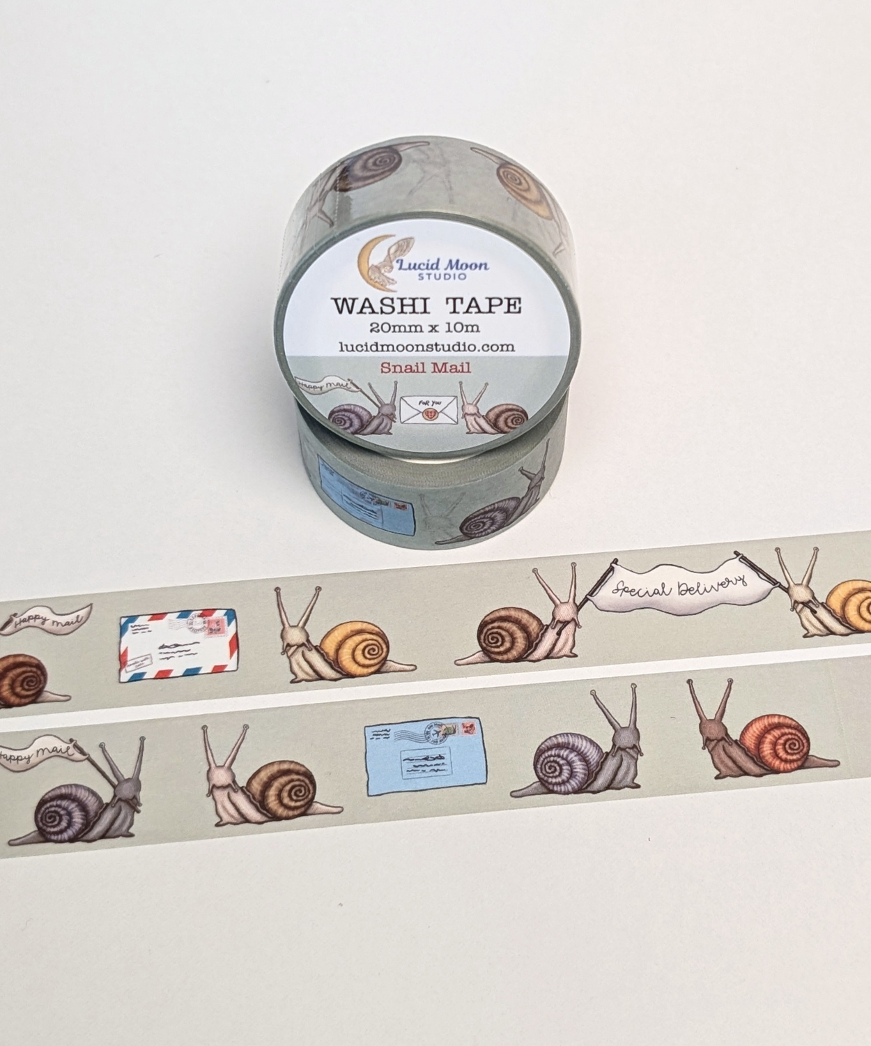 20mm wide washi tape with snails and mail themed hand-drawn illustrations on a mint green background