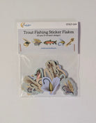 A clear plastic bag containing 20 trout fishing sticker flakes on a white backing card. The package is labeled 'Trout Fishing Sticker Flakes' with the brand 'Lucid Moon Studio' visible, and the flakes inside show various illustrated fish and fly lure designs in muted earthy tones.